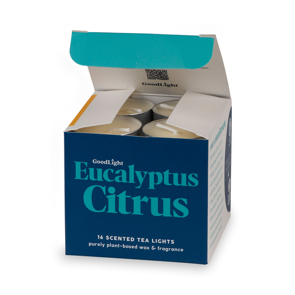 Open box of GoodLight Eucalyptus Citrus scented tea lights on a white background