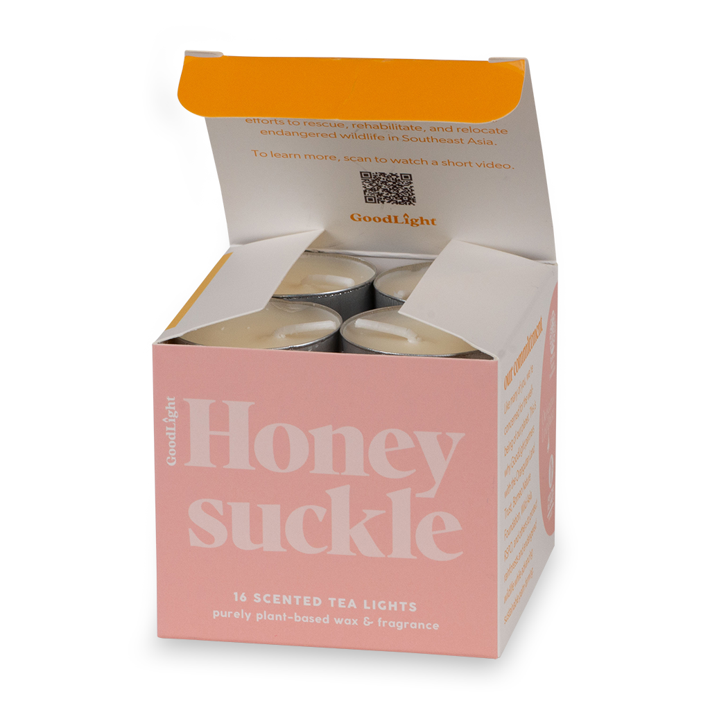 Open box of GoodLight's Honeysuckle scented tea lights 