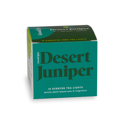 Green and blue box of GoodLight's Desert Juniper scented tea lights on a white background