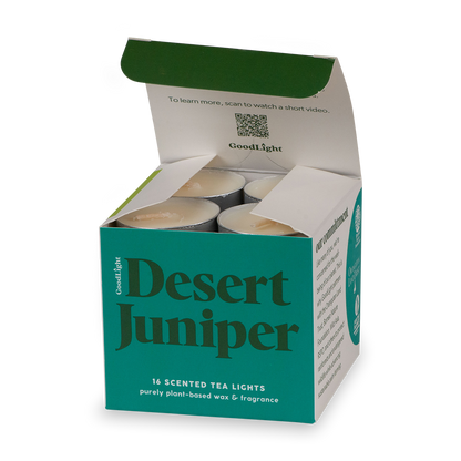 An open box of 'Desert Juniper' scented tea lights 