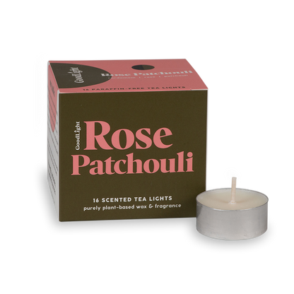 Rose Patchouli scented tea light candle with packaging on a white background