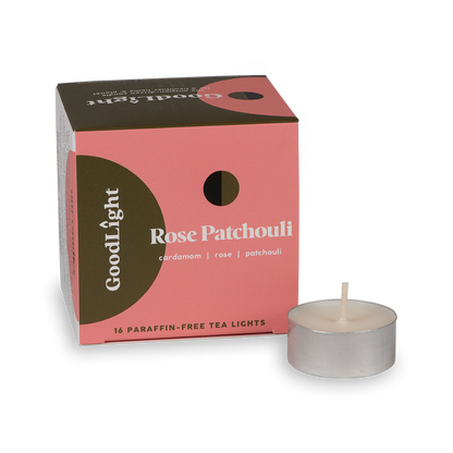 Rose Patchouli tea light candle with GoodLight packaging on a white background
