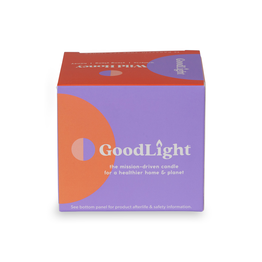 GoodLight candle packaging with purple and orange design on a white background