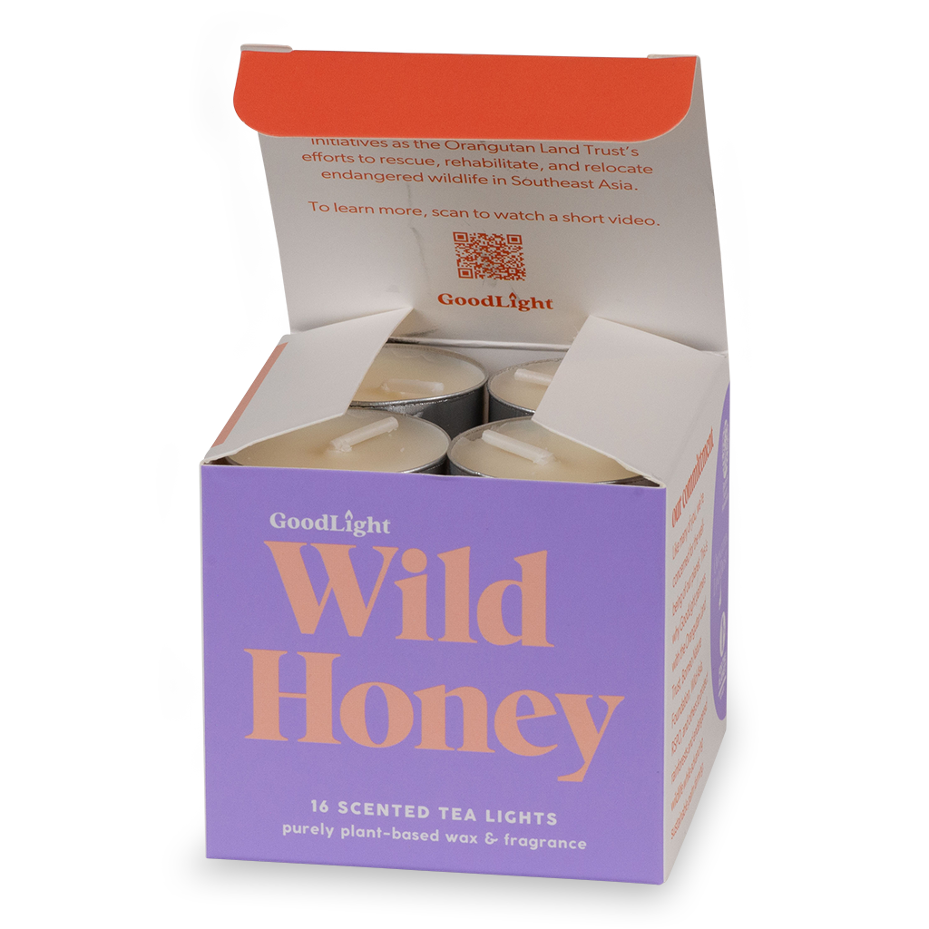 Box of GoodLight Wild Honey scented tea lights with a purple and orange design