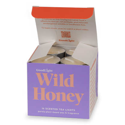 Box of GoodLight Wild Honey scented tea lights with a purple and orange design