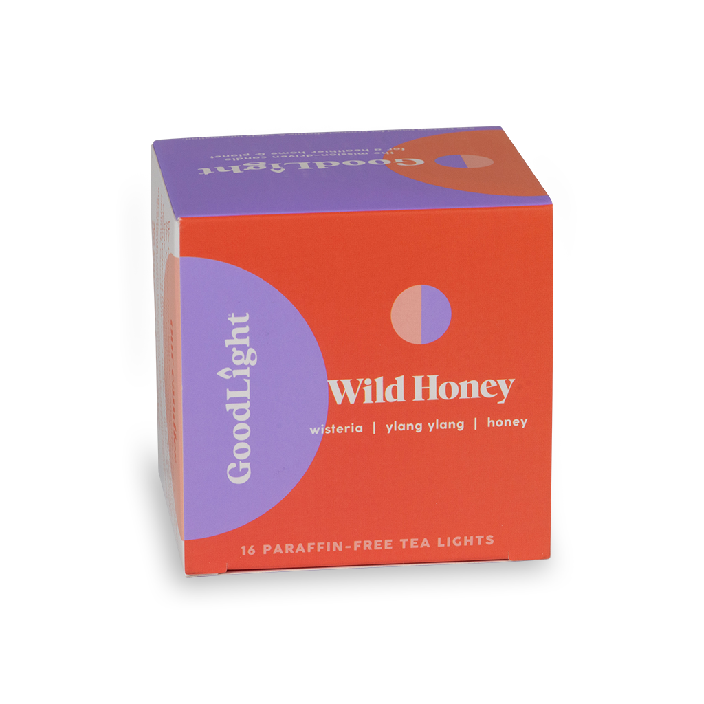 Box of GoodLight Wild Honey tea lights on a white background