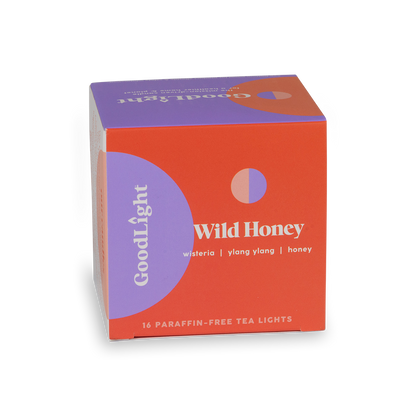 Box of GoodLight Wild Honey tea lights on a white background